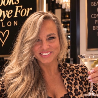 Trish Brewer smiling in her salon